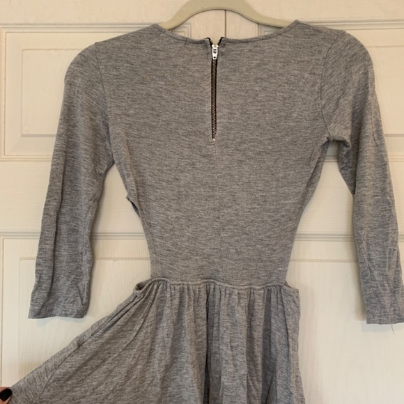 Peplum Shirt with Cut Outs - Picture 4 of 4